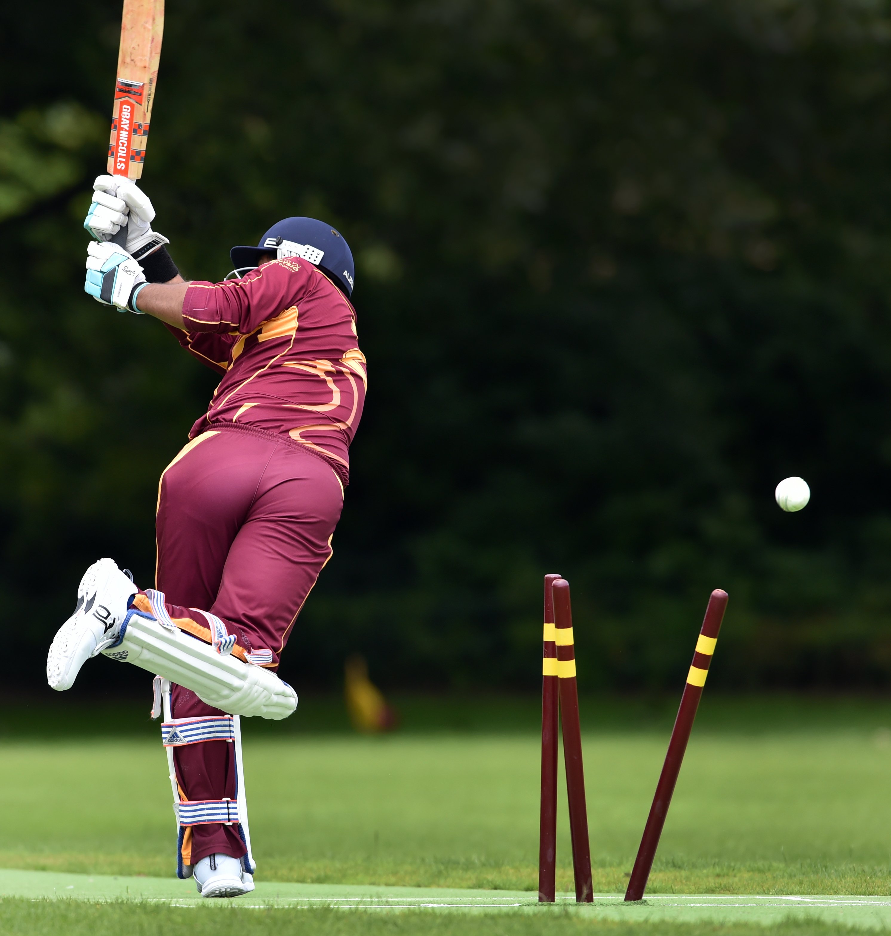 North East Valley batsman Razib Dutta Omi is bowled during his team’s match against the Bay Area...