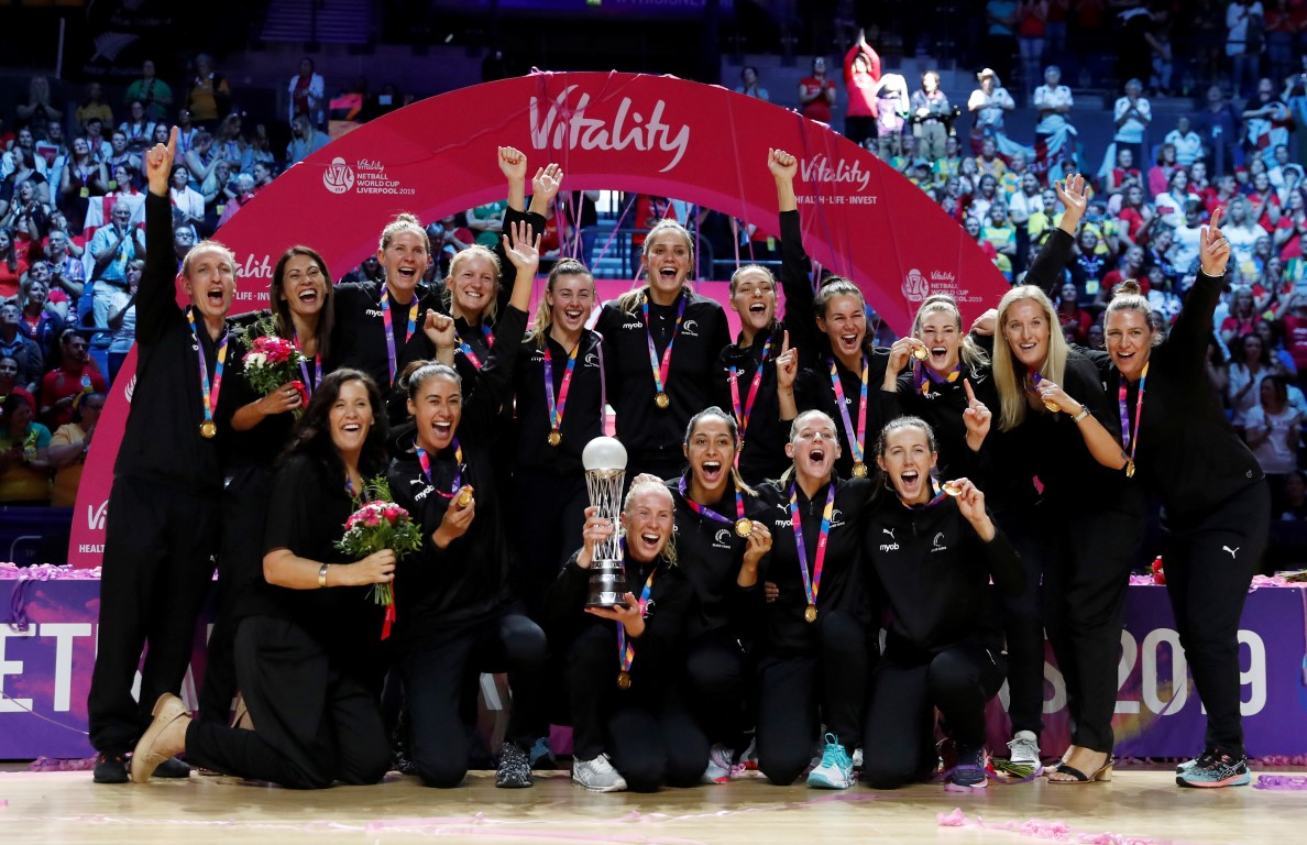 The Silver Ferns celebrate with the trophy after winning the World Cup. Photo: Reuters 