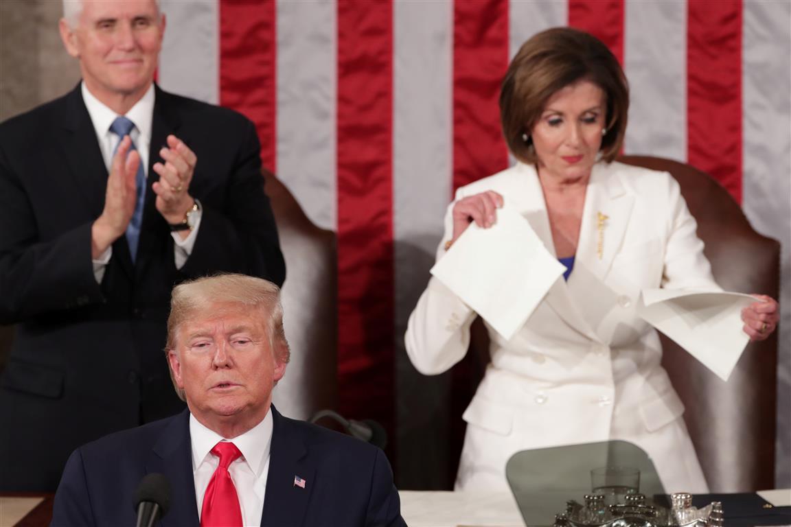 Speaker of the House Nancy Pelosi rips up US President Donald Trump's speech after his State of...