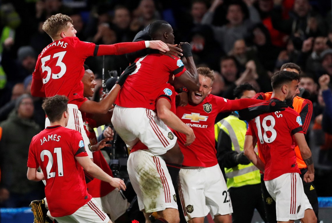 Manchester United players celebrate their second goal against Chelsea. Photo: Reuters