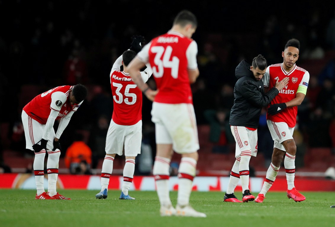 Arsenal players react after their match against Olympiakos Piraeus. Photo: Reuters 