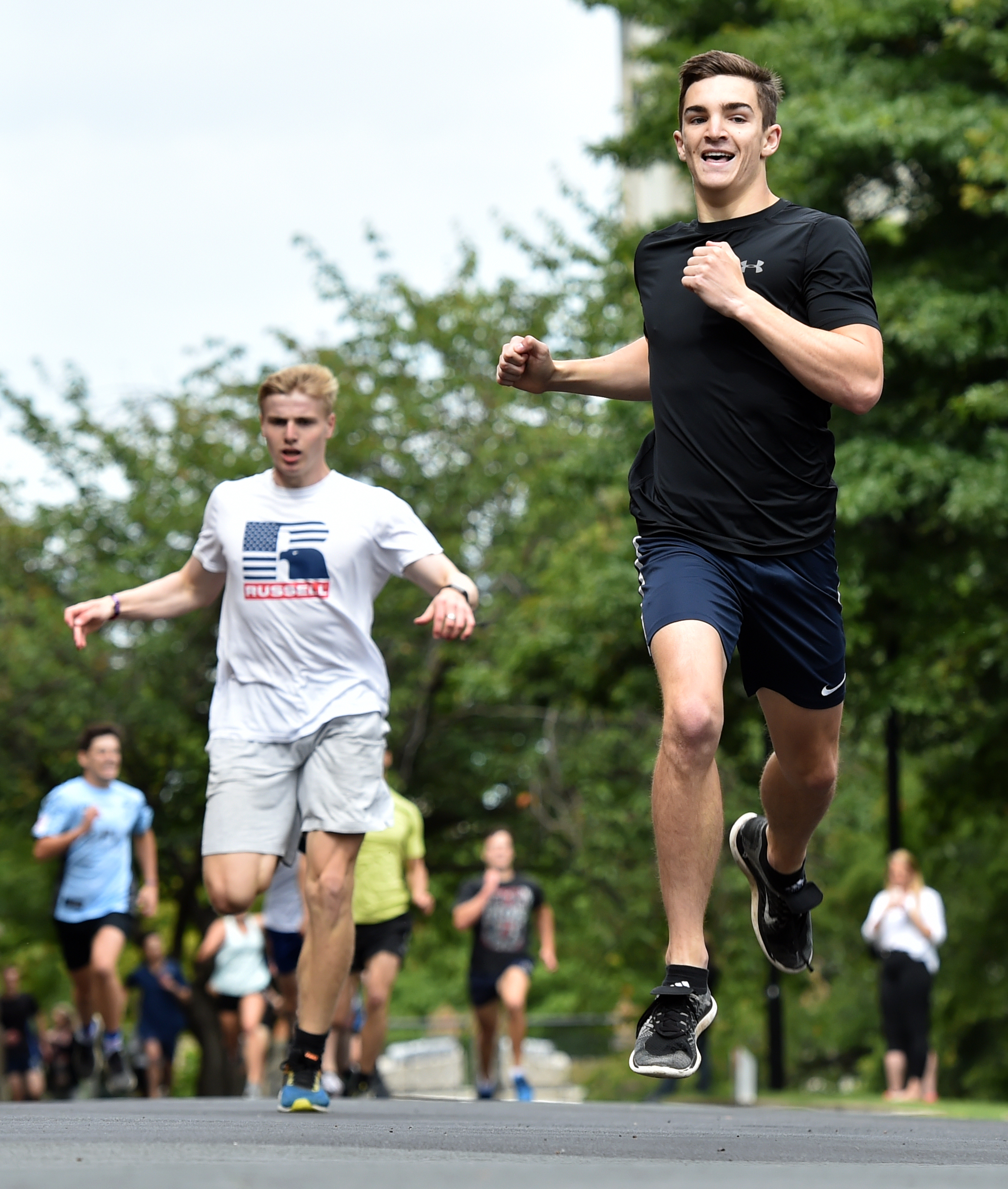 Shay Veitch crosses the line yesterday to win the University Clocktower race ahead of second...