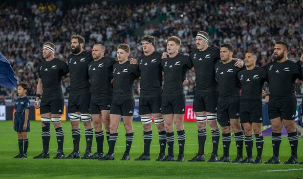 The All Blacks sing the national anthem before their Rugby World Cup semi-final match against...