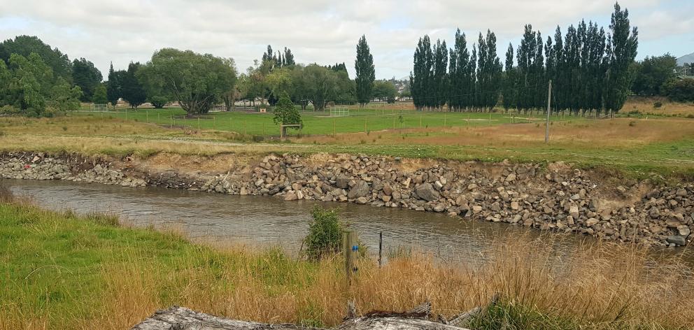 The recent flooding exposed an old landfill in Gore. Photo: Gore District Council