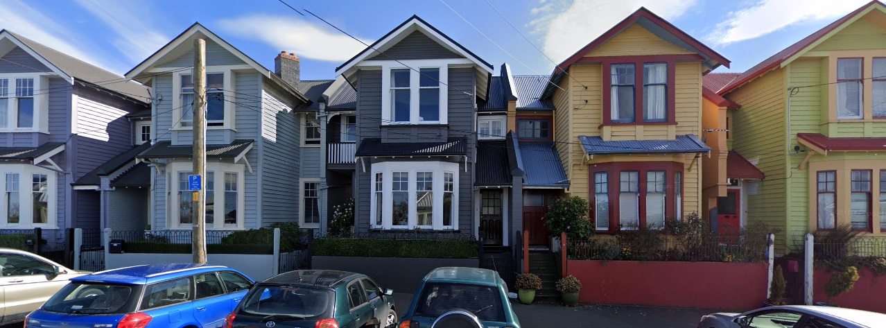 Terraced houses in Adam St in the Dunedin suburb of City Rise. Photo: Google Maps Terraced houses in Adam St in the Dunedin suburb of City Rise. Photo: Google Maps