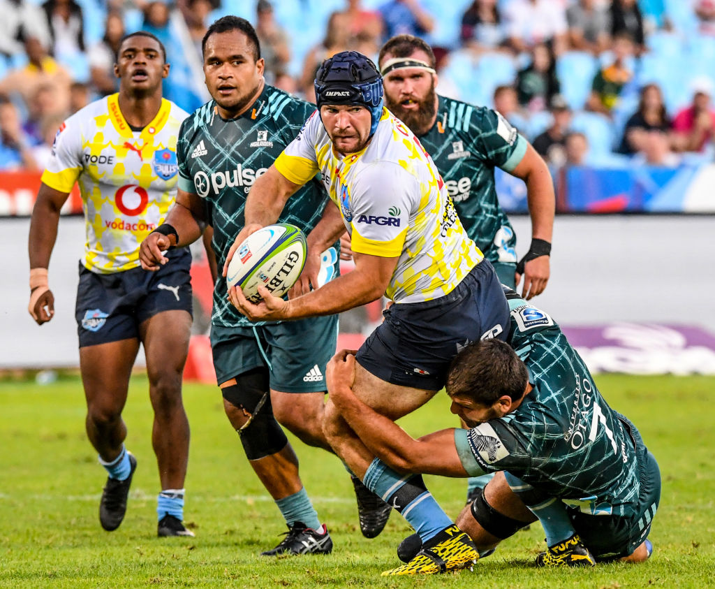 The Bulls' Marco Van Staden tries to bust through the Highlanders defence. Photo Getty Images