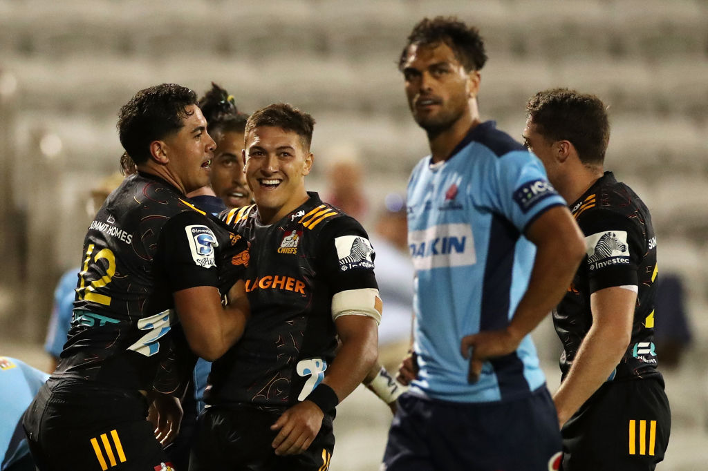 Chiefs players celebrate a try by Anton Lienert-Brown. Photo: Getty