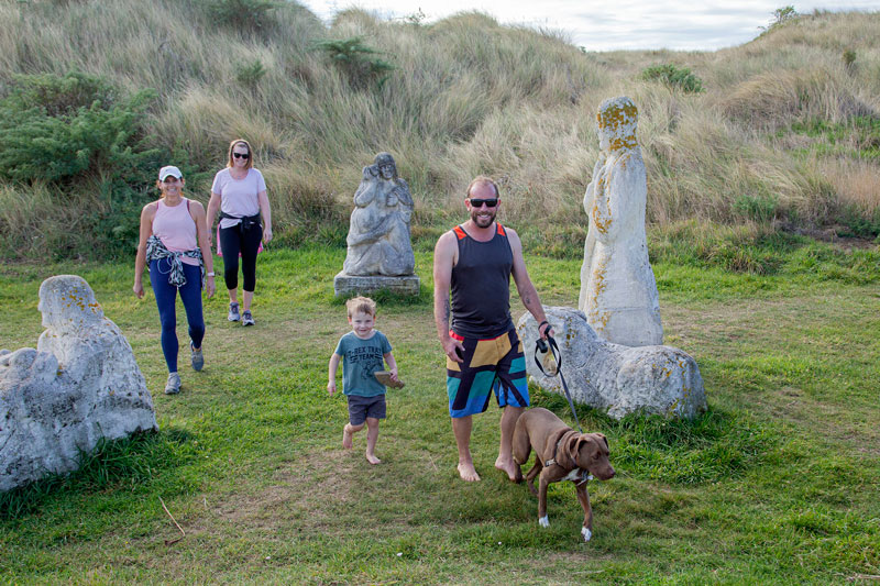 Walkers at South Brighton Sculpture Park.