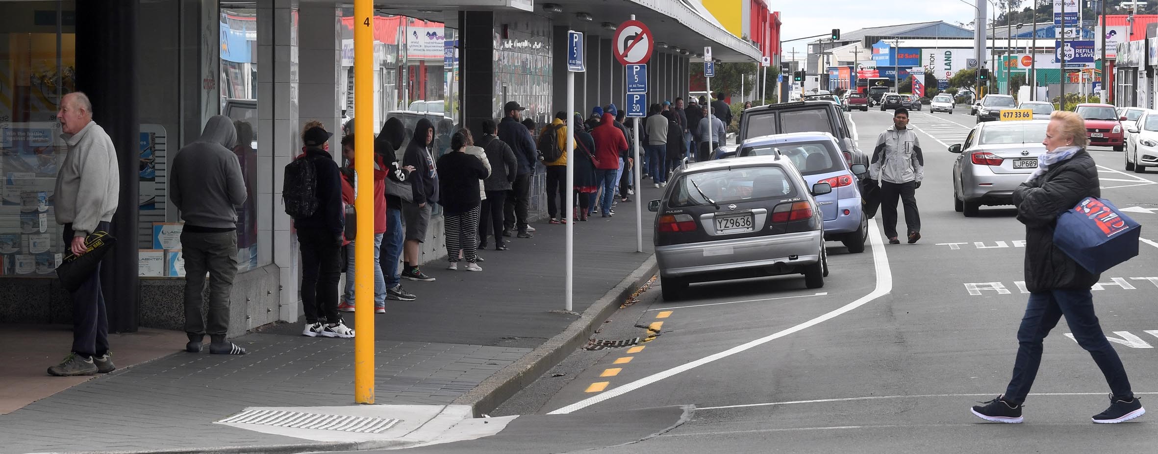 A long queue stretches out of Pak 'n Save in Dunedin and along Hillside Rd at lunchtime. PHOTO:...