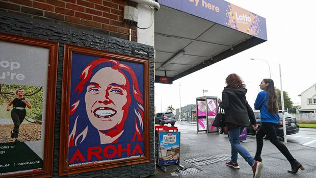 A poster of Prime Minister Jacinda Ardern, Aroha, outside a dairy in Auckland. Photo: NZ Herald