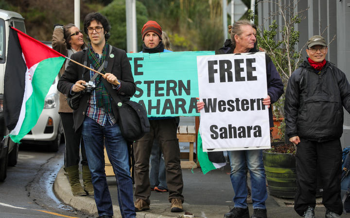 Protesters outside ship at Lyttelton Harbour Photo: RNZ / Nate McKinnon