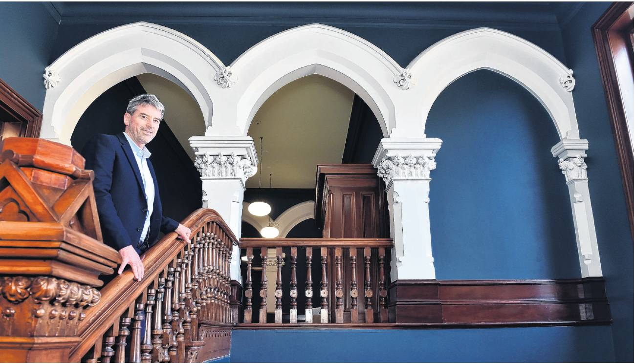 Mercy Hospital chief executive officer Richard Whitney stands near the renovated first floor at...