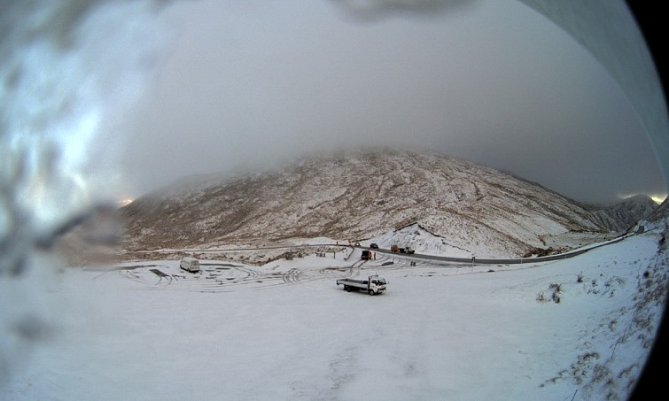 A webcam image showing snow on the Crown Range Rd this morning. Photo: MetService