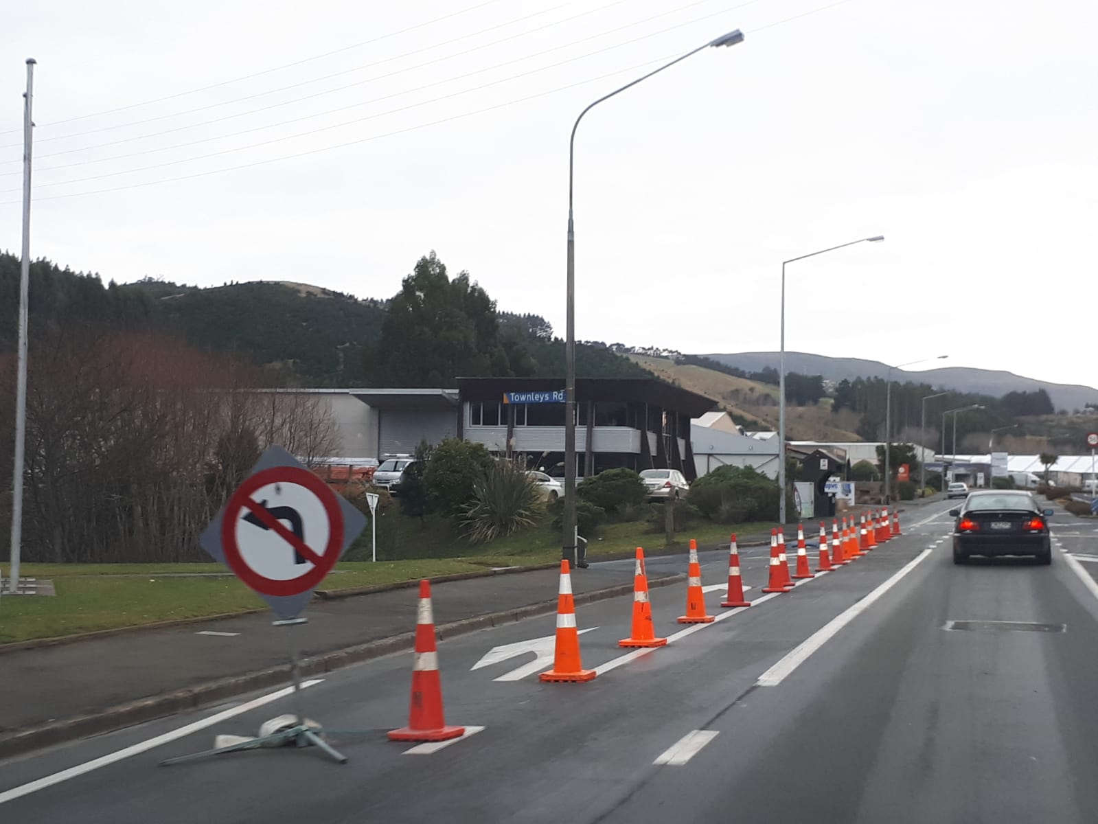 Townleys Rd was closed this morning after the spill. Photo: Supplied