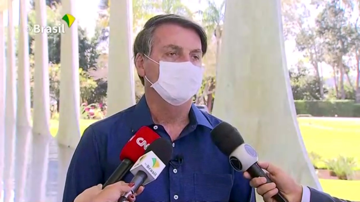 Brazil's President Jair Bolsonaro confirms his positive coronavirus diagnosis as he speaks to the...