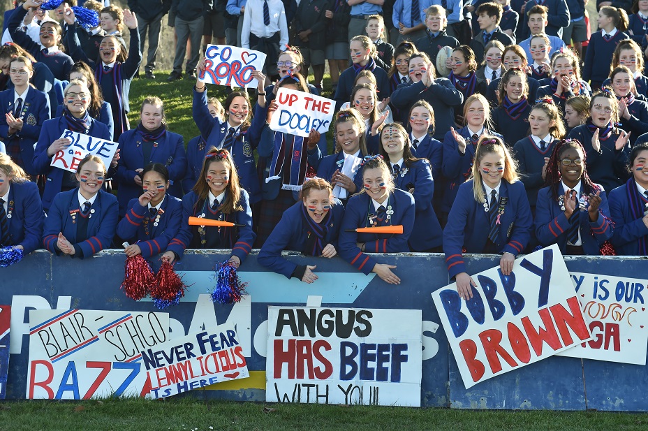 St Kevin's supporters get in behind their team during the match. Photo: Gregor Richardson