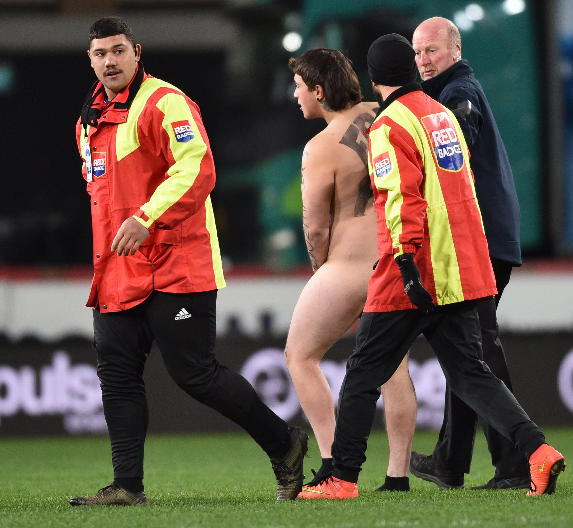 A streaker runs onto the field during the round 4 Super Rugby Aotearoa match between the...