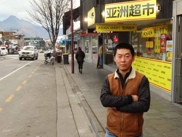 Asian Mart owner Tau Su on the loading zone/taxi stand outside the Shotover St store. Photo:...