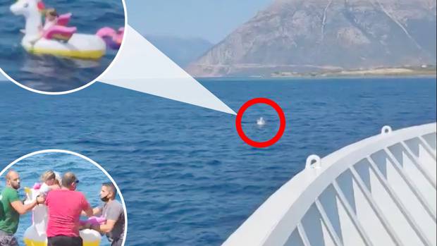 A young girl was rescued by ferry crew after she was swept out to see on a giant inflatable...