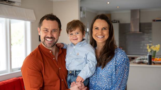 Sam Wallace and his partner Sarah Bowman with their son Brando. Photo: Sylvie Whinray / NZ Herald