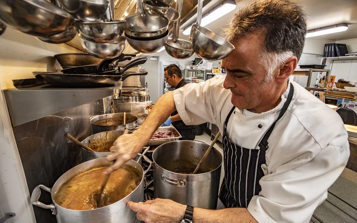  Chef Phil Hazeldine prepares the dishes for the hunters. Photo: Fish & Game New Zealand.