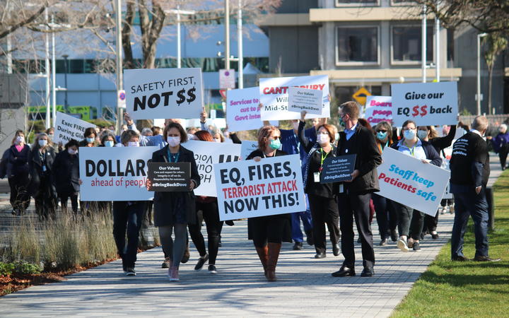 Staff from Christchurch Hospital make their feelings clear outside the CDHB offices. Photo: RNZ /...