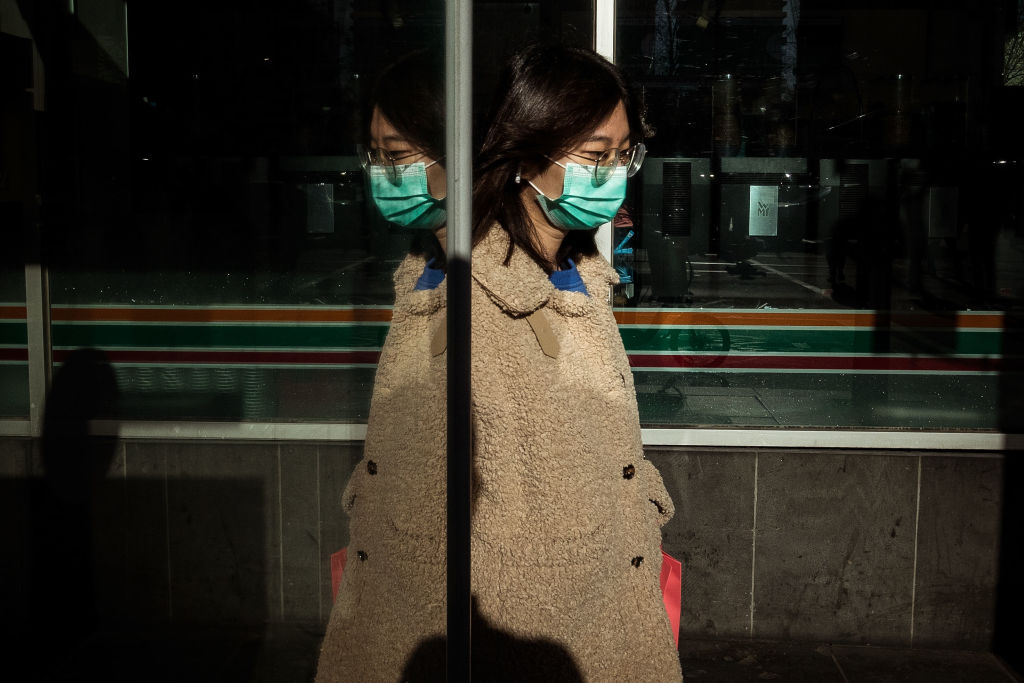 A woman in a face mask in central Melbourne. Photo: Getty