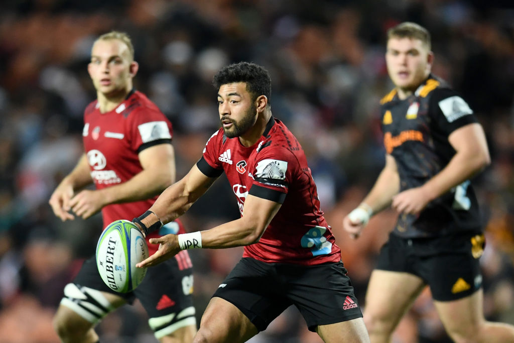 Richie Mo'unga of the Crusaders gets a pass away against the Chiefs. Photo: Getty Images