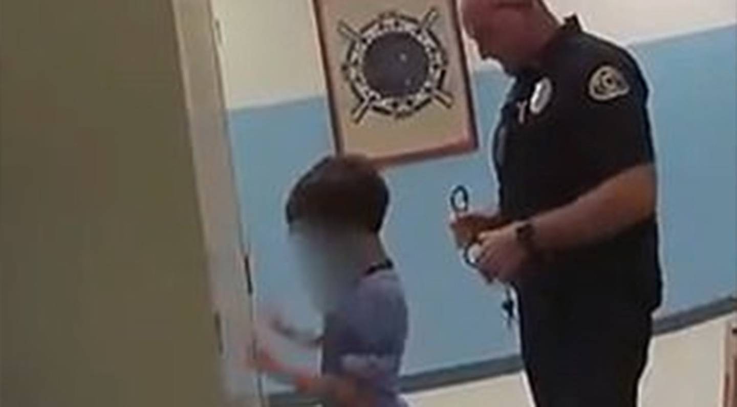 The officers told the child he's going to jail as they tried to put him in handcuffs but they...