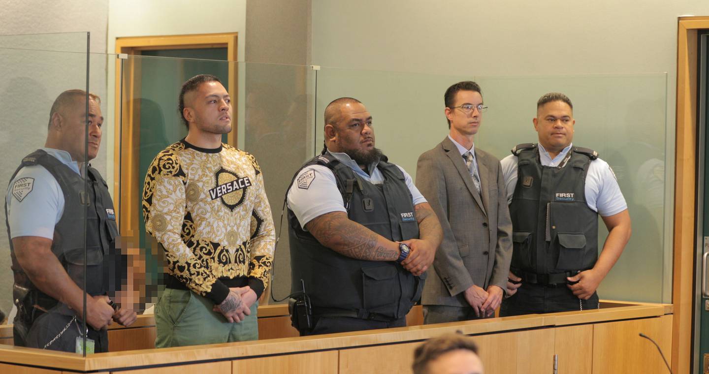 Tyson Daniels, in the gold Versace top, and Auckland lawyer Andrew Simpson at their sentencing...