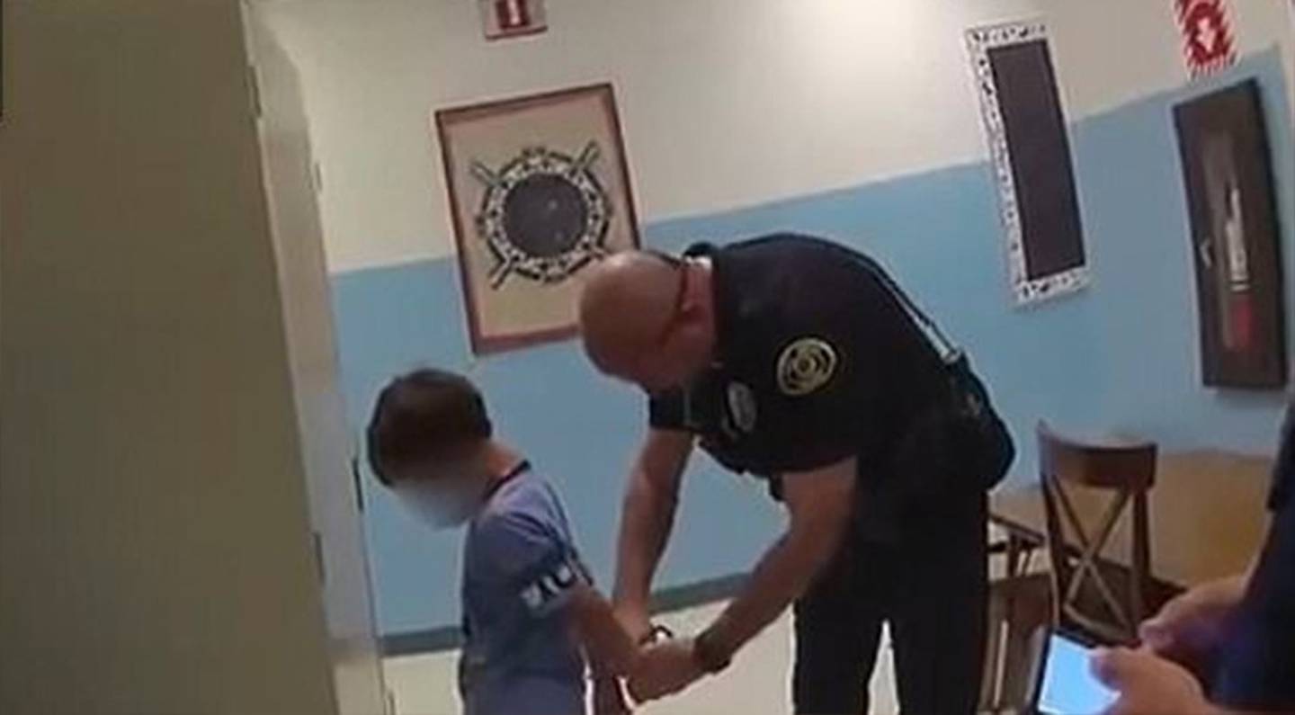 The officers told the child he's going to jail as they tried to put him in handcuffs but they...