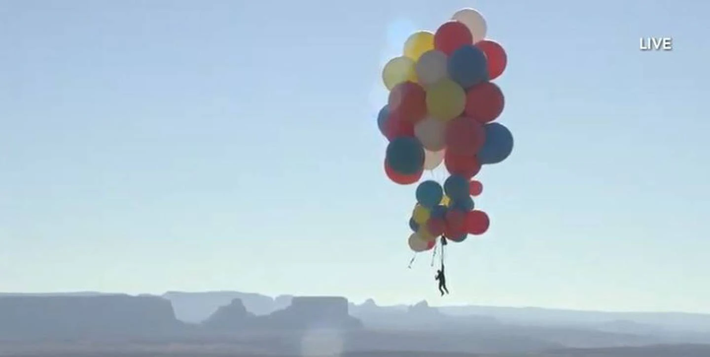 He didn't even put his parachute on until he was approximately halfway up! Photo: David Blaine