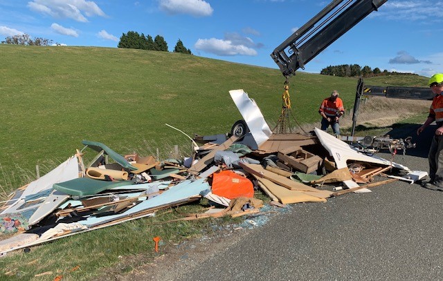 The caravan was blown off the highway yesterday afternoon. Photo: supplied 