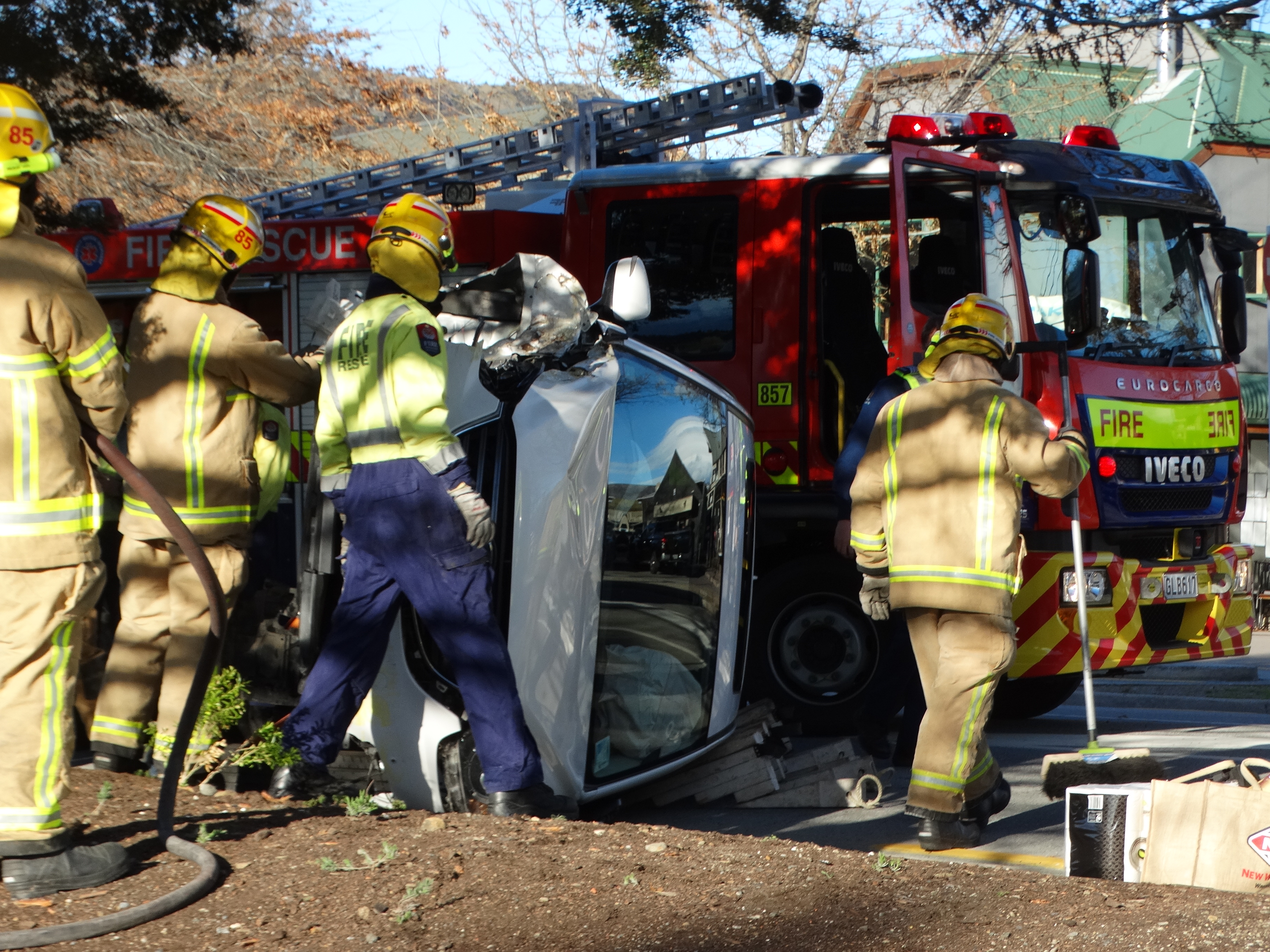 Fire crews at the scene of the crash in Wanaka today. Photo: Mark Price