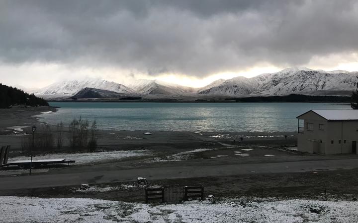 Lake Tekapo earlier this week when a snow storm was passing through. Photo: Supplied via RNZ /...