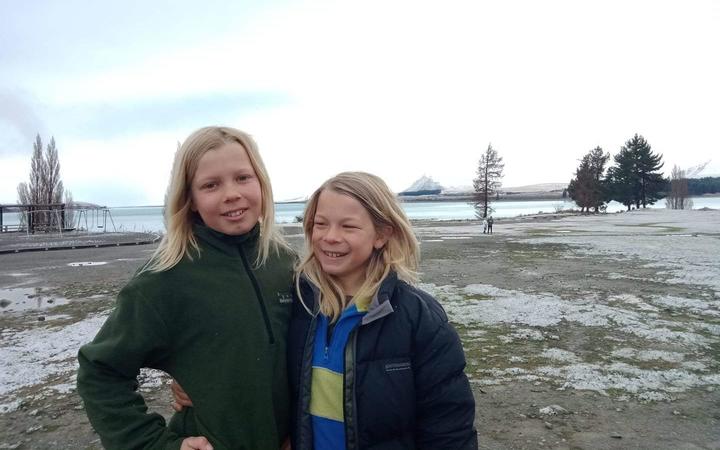 Baxter (left) and Logan Mosey-Reid enjoying the snow in Tekapo today. Photo: Supplied