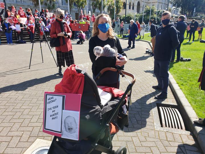 Georgia Choveaux and her son, Josef, who is nearly six weeks old, joined the rally to show her...
