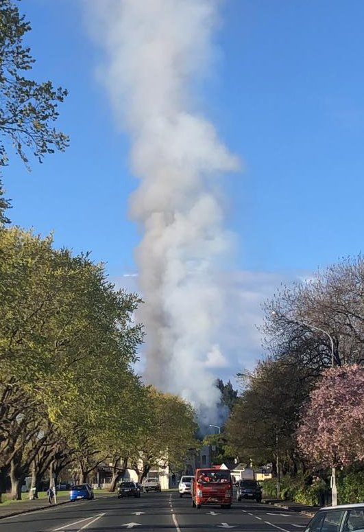 Smoke billows out of a commercial property in Wilkie Rd in Dunedin yesterday morning, as seen...