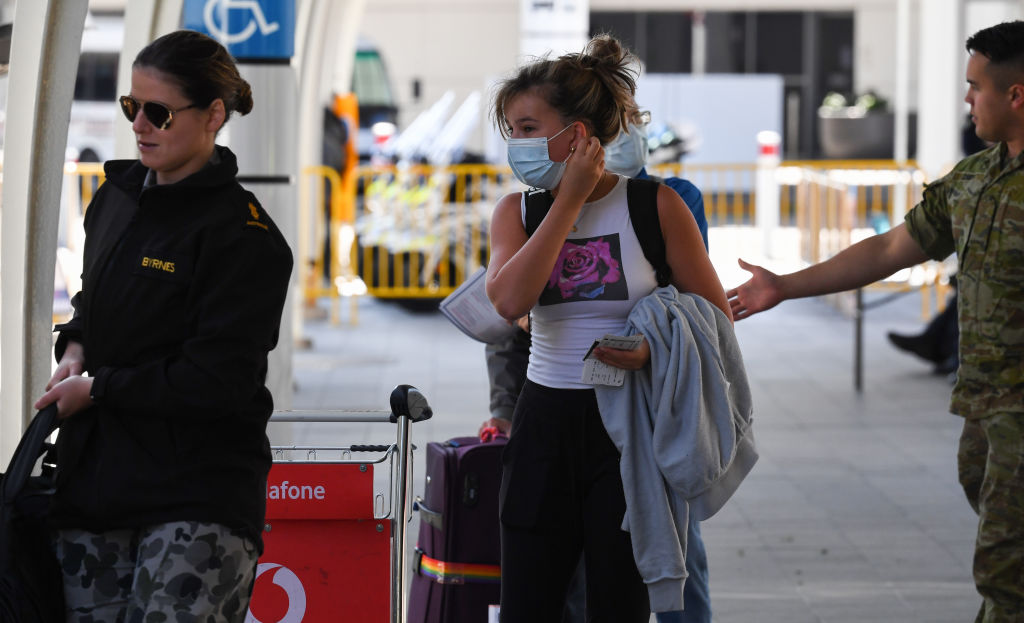 Recently arrived passengers at Sydney International Airport. Photo: Getty