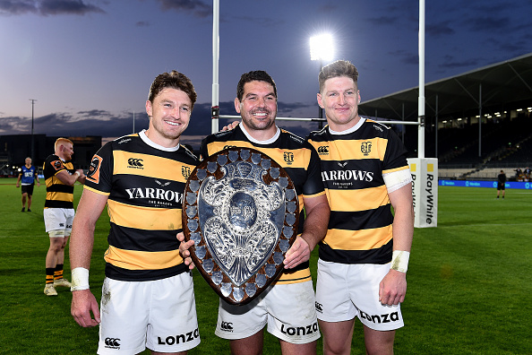  Beauden Barrett Ben May and Jordie Barrett pose for a photo with the Ranfurly Shield. Photo: Joe...