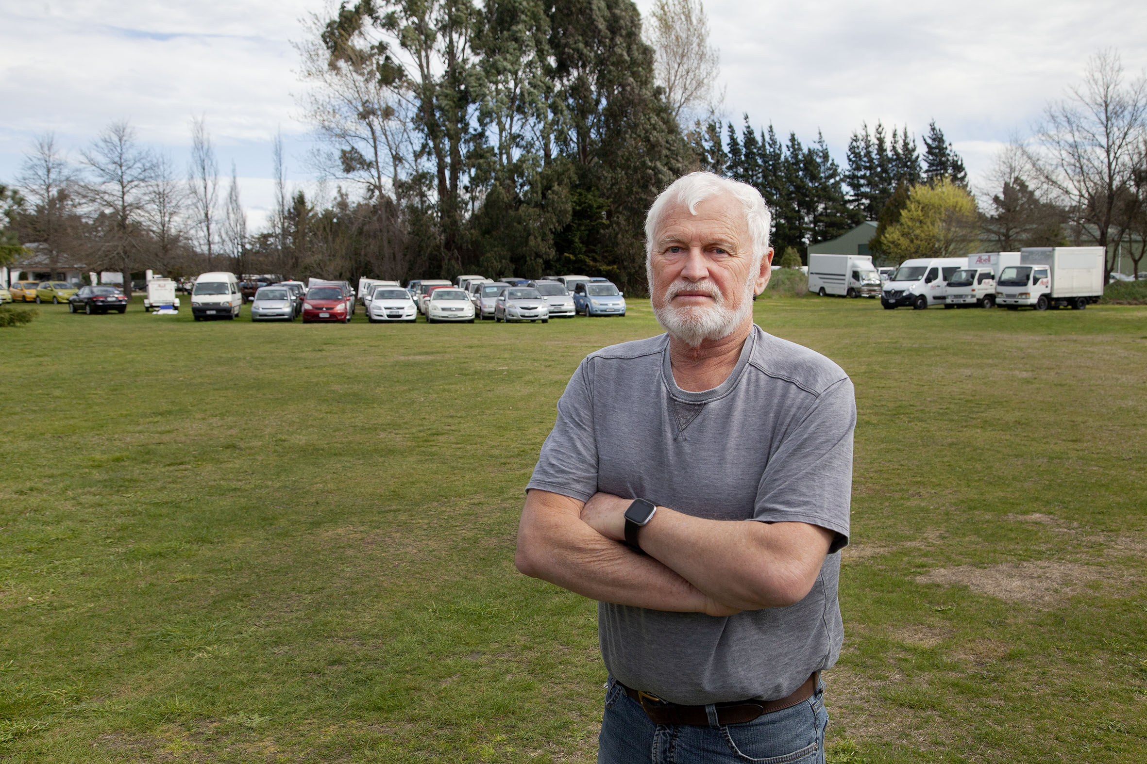 Allan Scott with some of the 80 vehicles he has on his property. Photo: Geoff Sloan