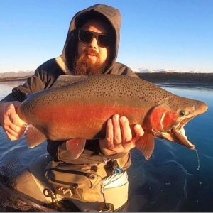 Te Awamutus Dyl Eyeington was the third angler to catch the trout. PHOTO: JACOBFISHINGNZ