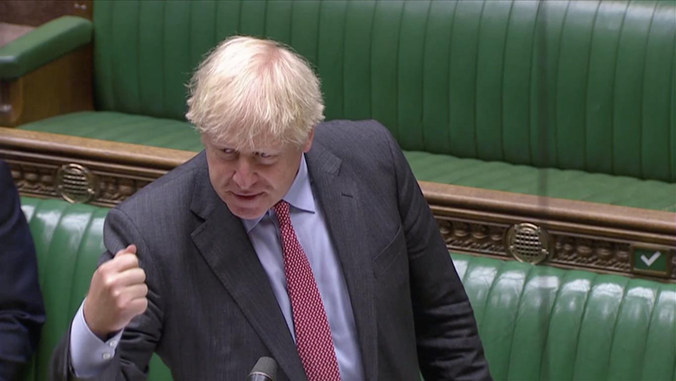 Boris Johnson speaks during the weekly question time debate in Parliament, in this screen grab...