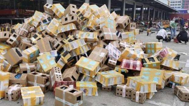 Boxes that had contained live pets at the Dongxing Logistics station in Luohe city. Thousands of...