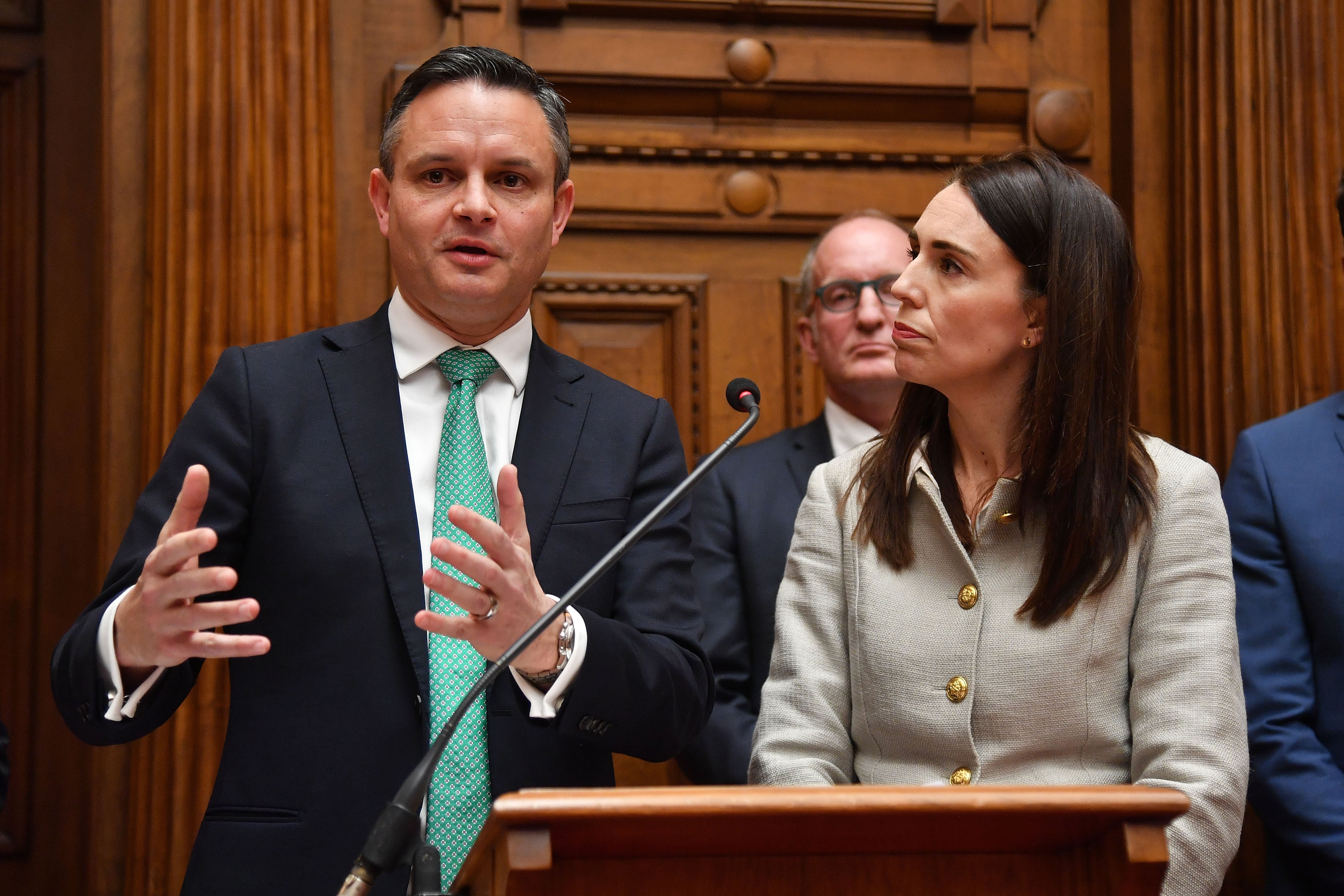 Climate Change Minister James Shaw and Prime Minister Jacinda Ardern speak during a press...