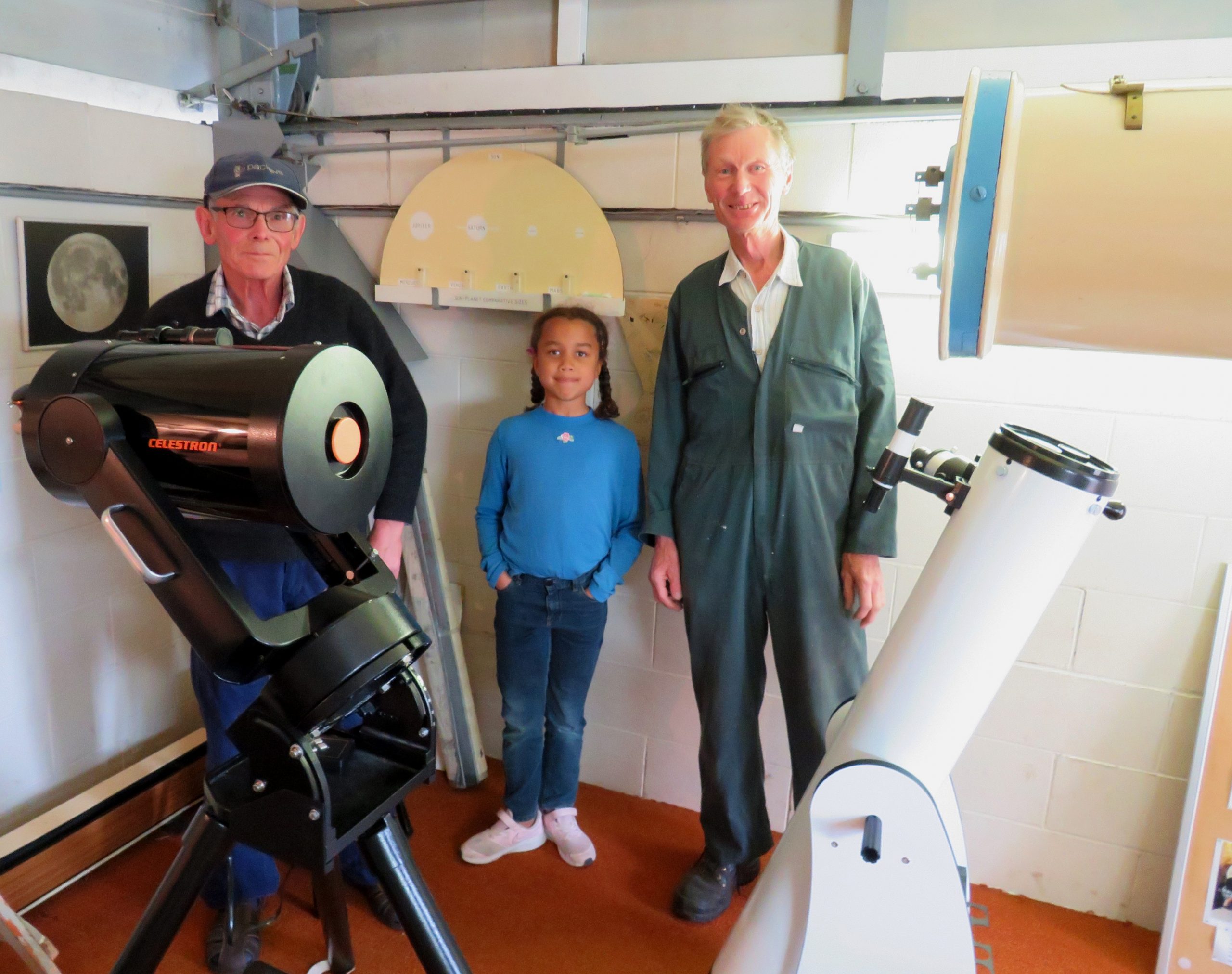 With the telescopes at the Ashburton College observatory are Ken Lucas, Claire Chibanguza and...