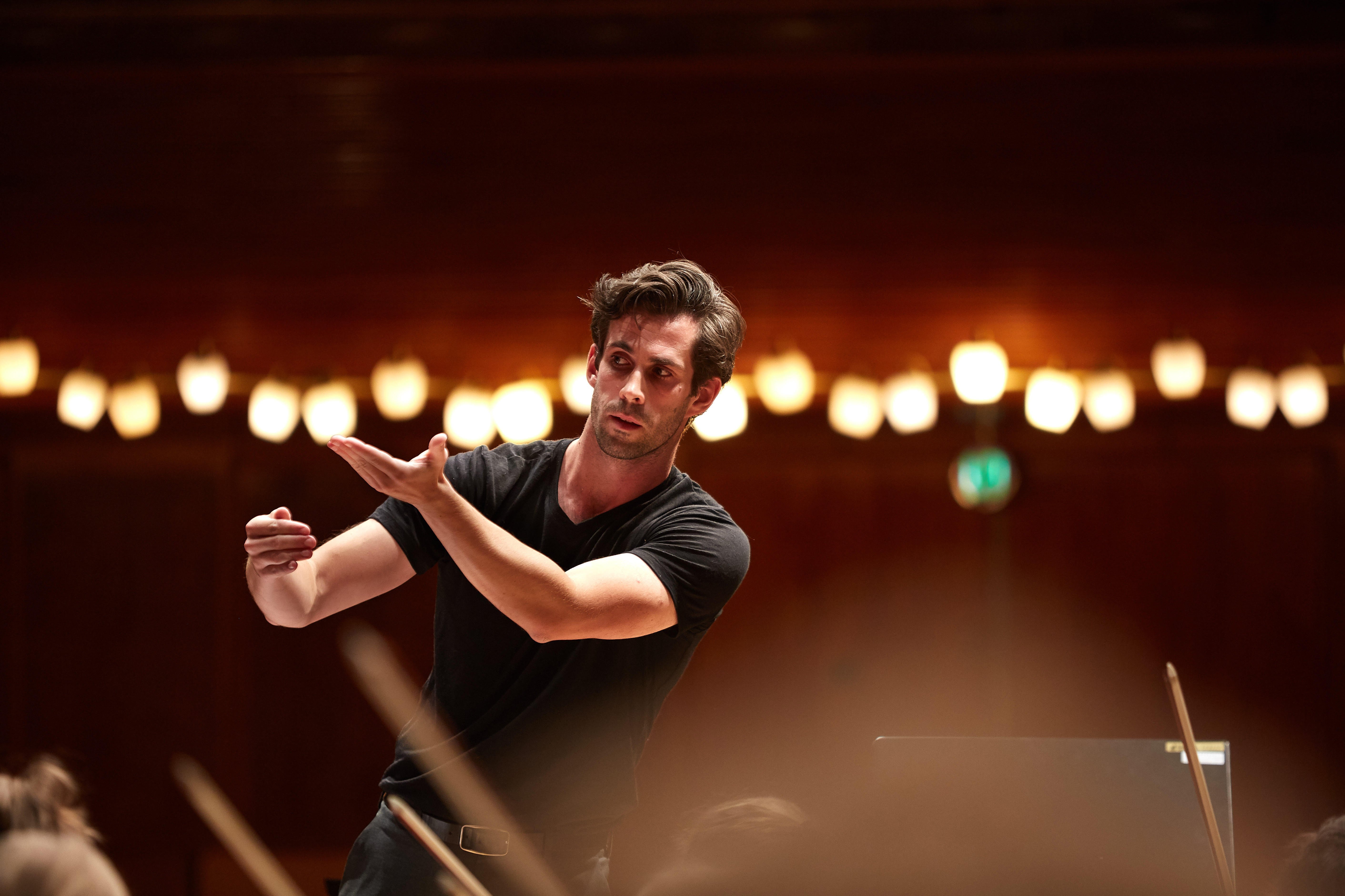 New Zealand assistant conductor-in-residence Vincent Hardaker rehearses. PHOTO: SUPPLIED