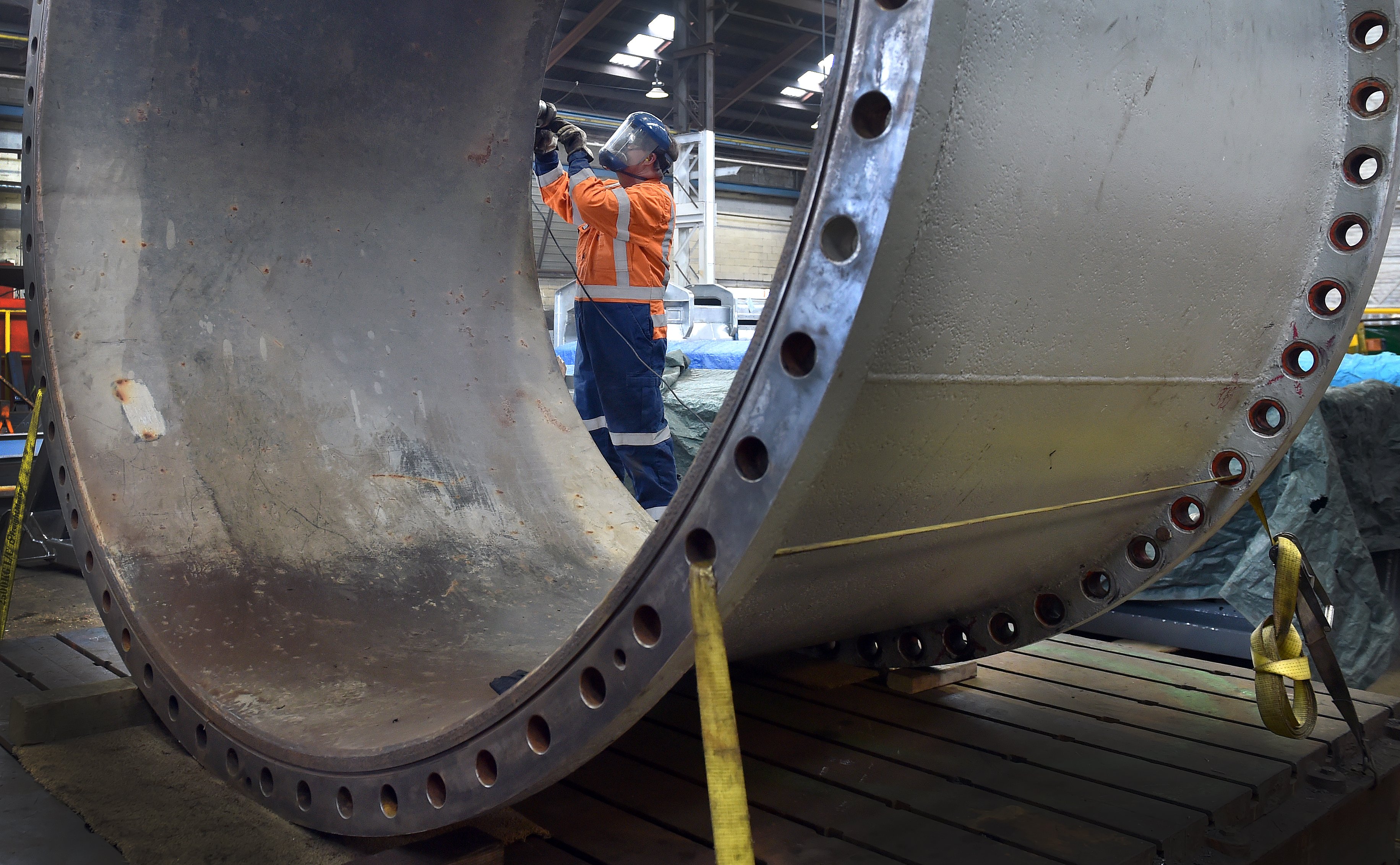 Greg Jordan of Farra Fabrication works on a bypass valve for a hydro power station on Monday....