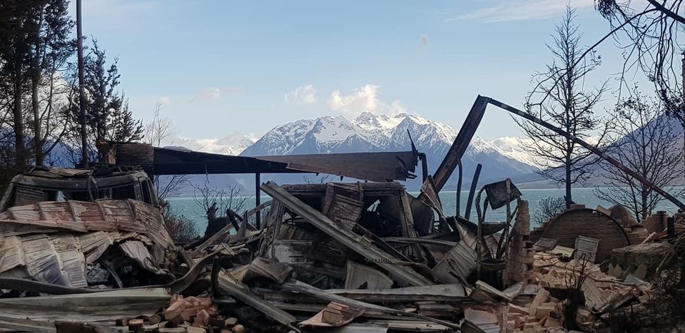 A fire-damaged property in Lake Ohau Village. Photo: Facebook/Gary Kircher