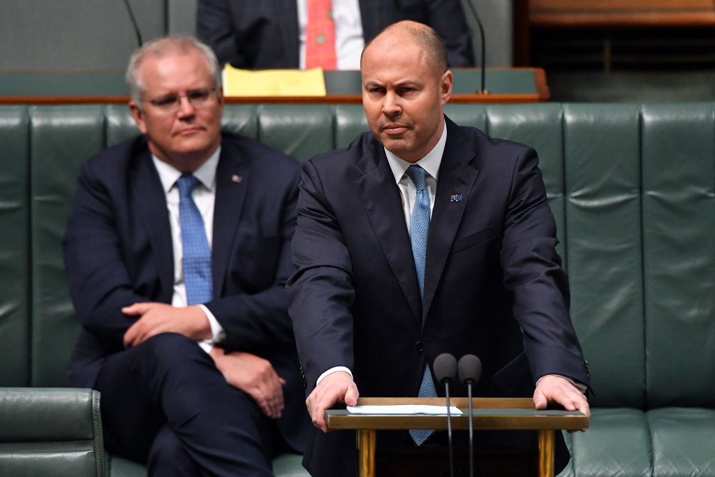 Australian Treasurer Josh Frydenberg delivers the budget in the House of Representatives in...